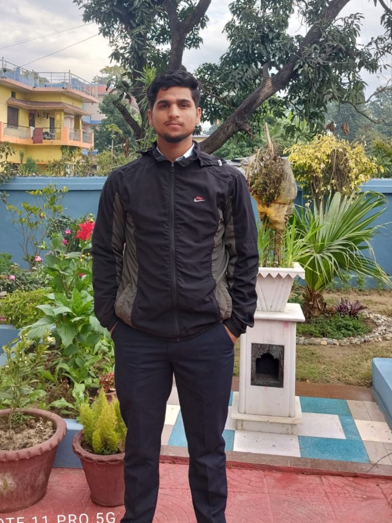Bibek Joshi standing outdoors